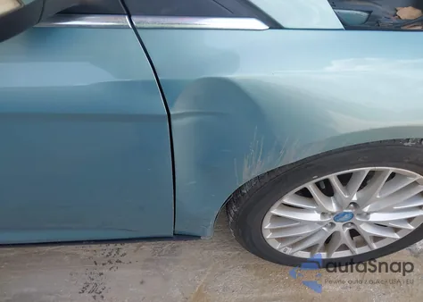 2012 Ford Focus Sel z USA, uszkodzony, nr VIN 1FAHP3M21CL168640